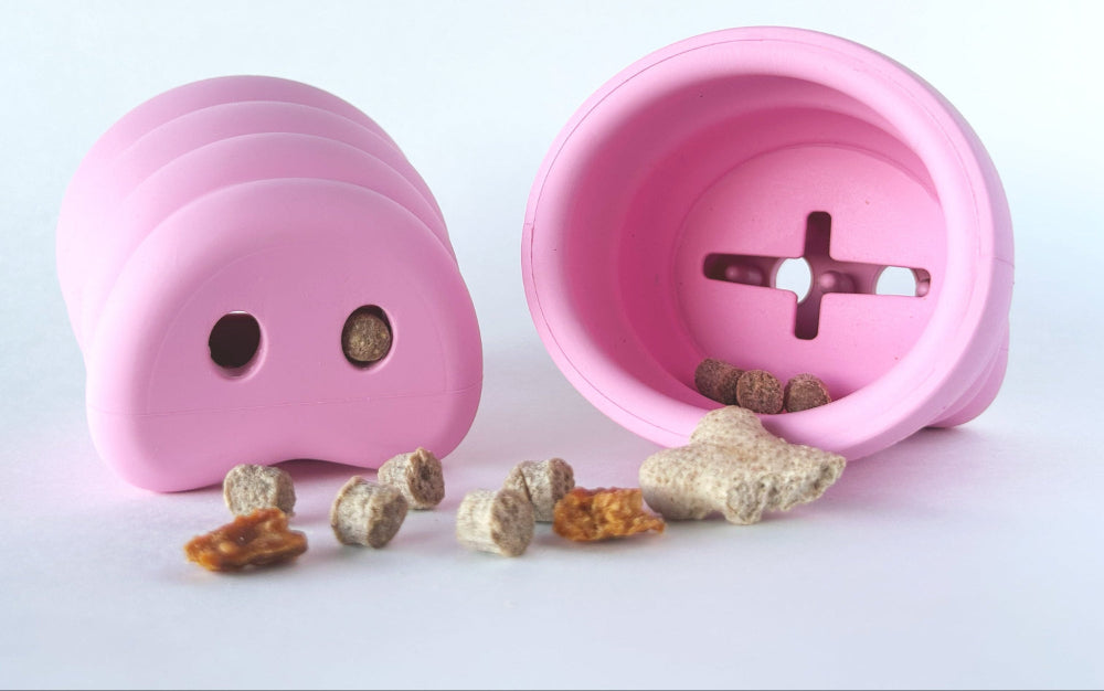 The Oinker Dog Toy Pig Snout View from front and back with treats.